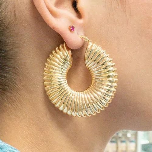 Par de aretes espiral de caracol