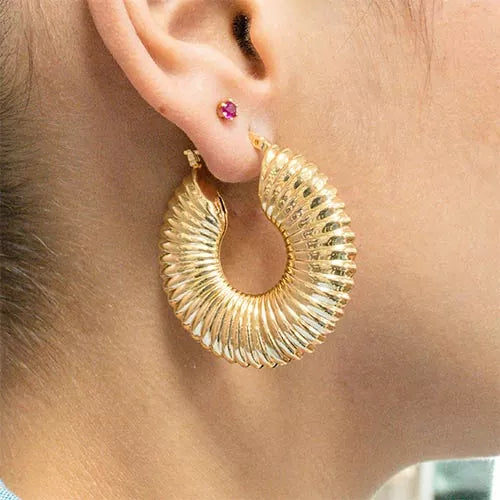 Par de aretes espiral de caracol